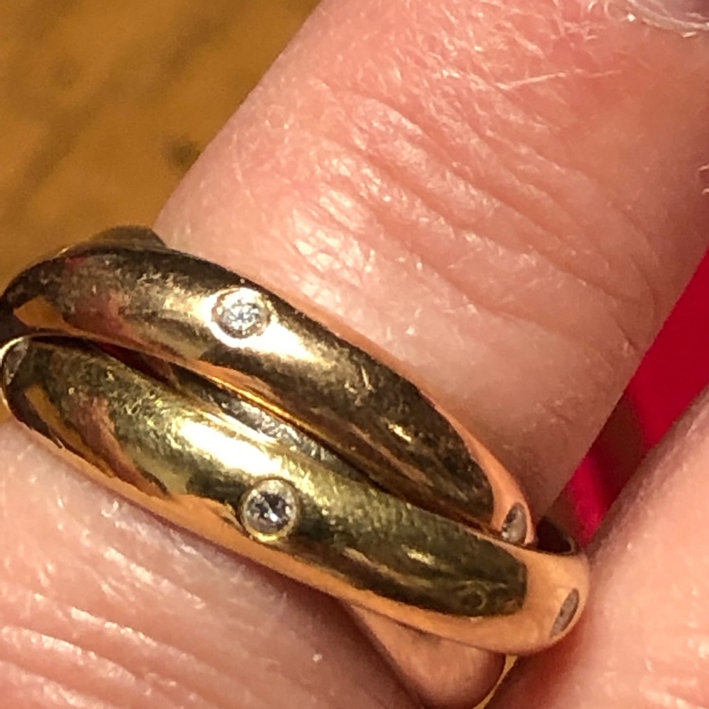 Authentic Cartier trinity ring with diamonds